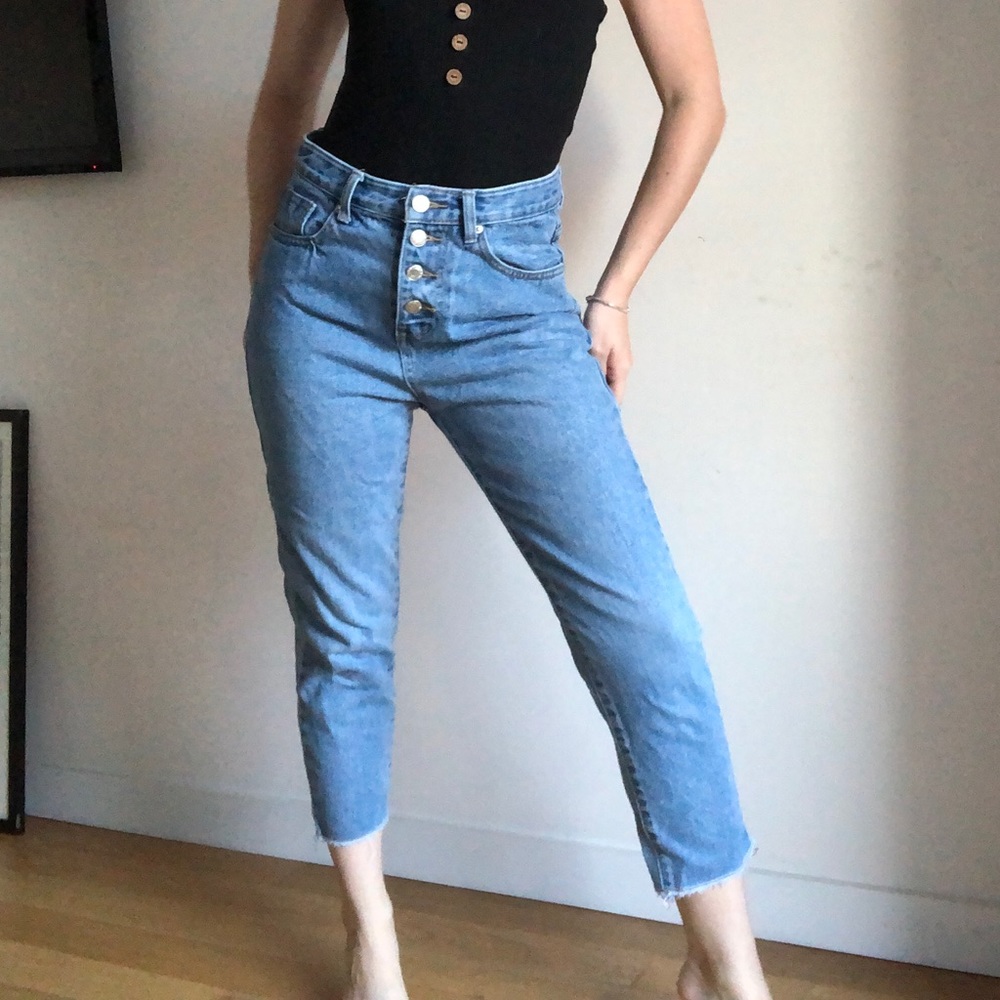 High waisted button up light wash jeans